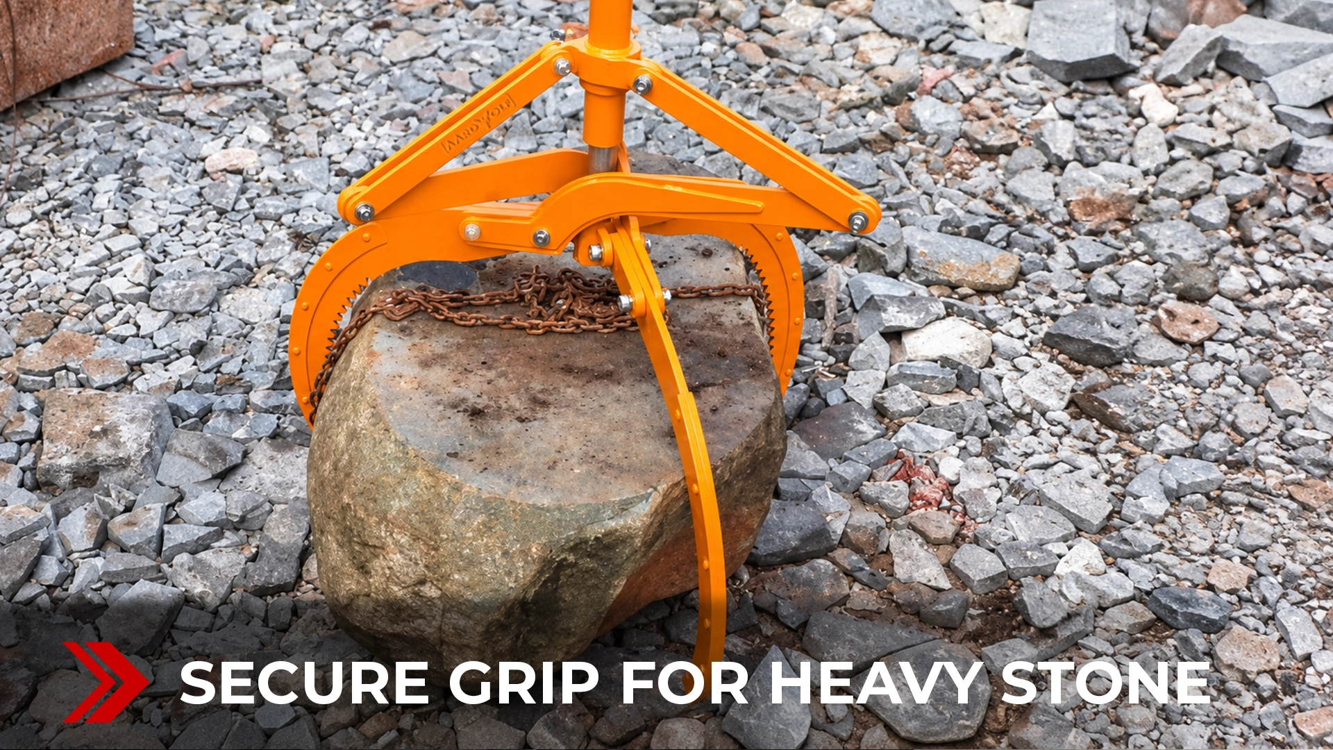 Aardwolf Stone Grapple ASG lifting a large stone block during operation